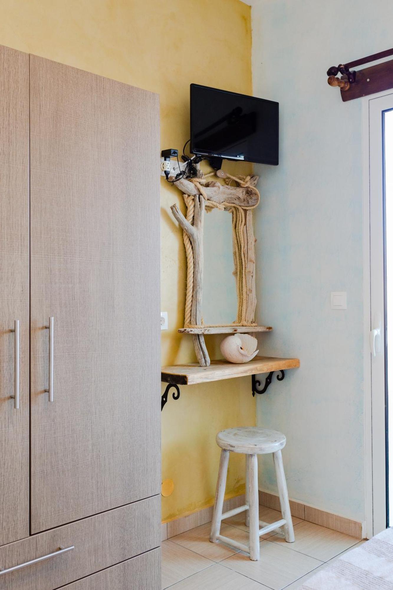Christos Studios And Family Apartments Stegna Quarto foto